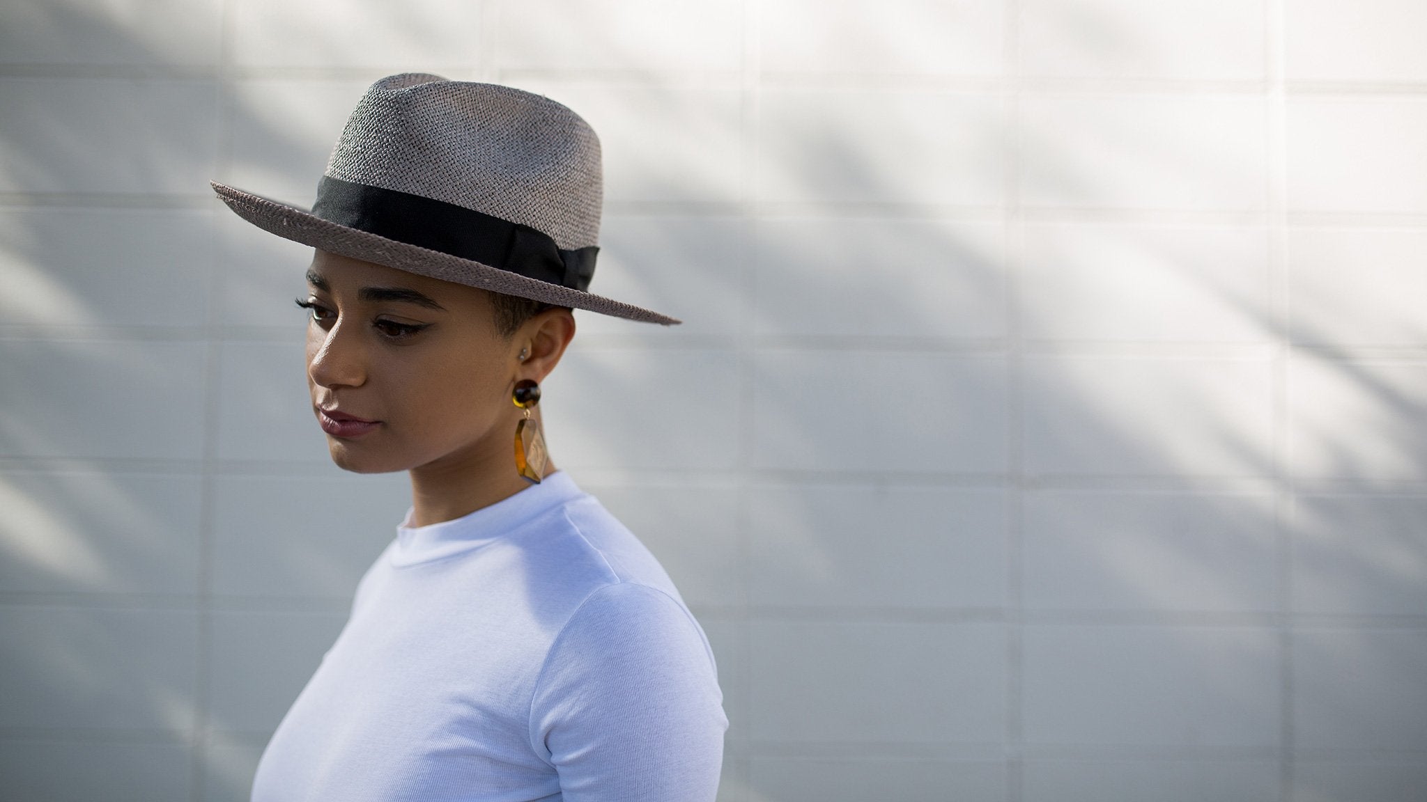 Goorin Bros. puerto lopez center dent wide brim straw fedora hat Grey hero shot on female model