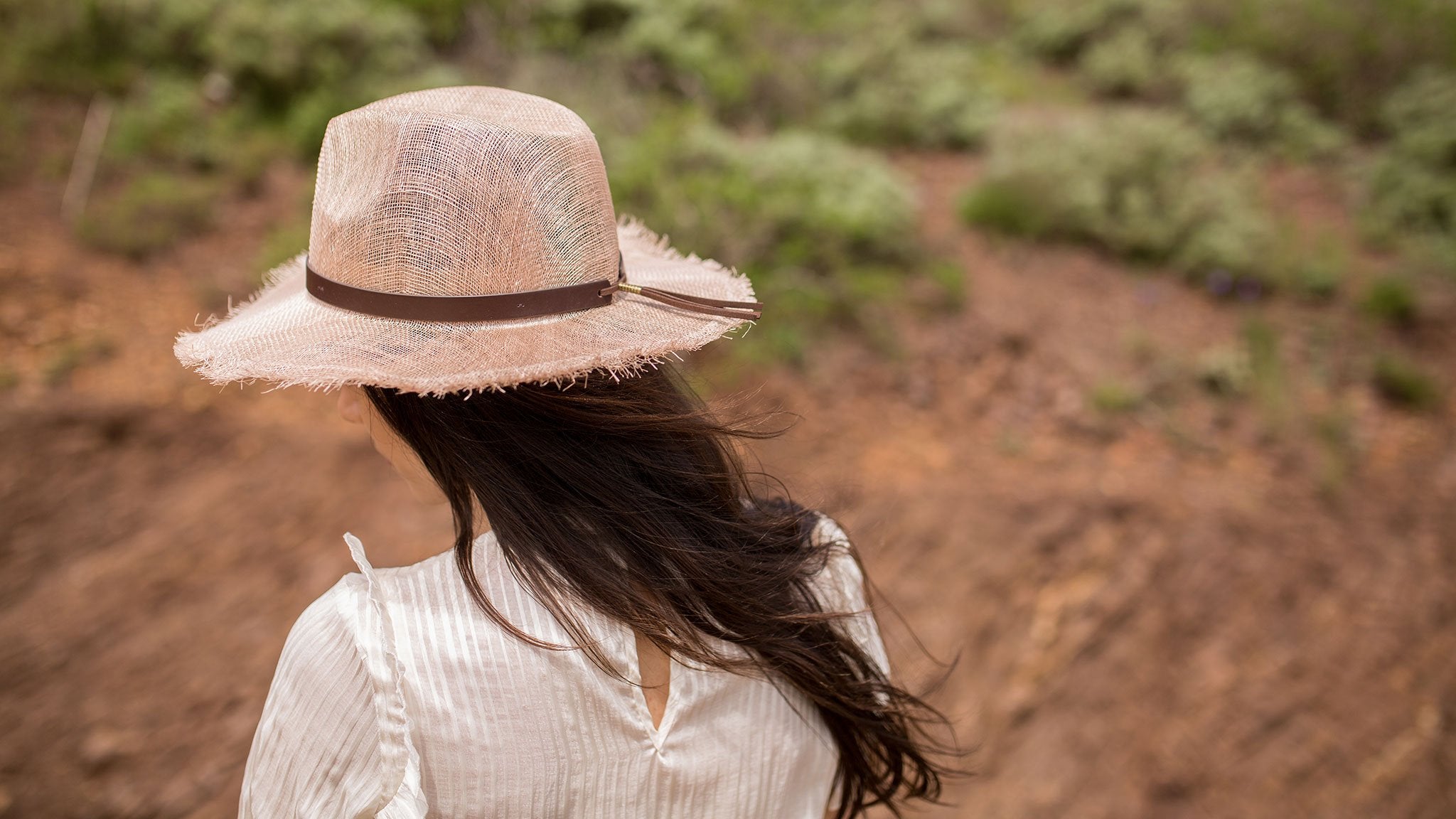 Goorin Bros. orange beach sinamay wide brim fedora Pink hero shot on female model