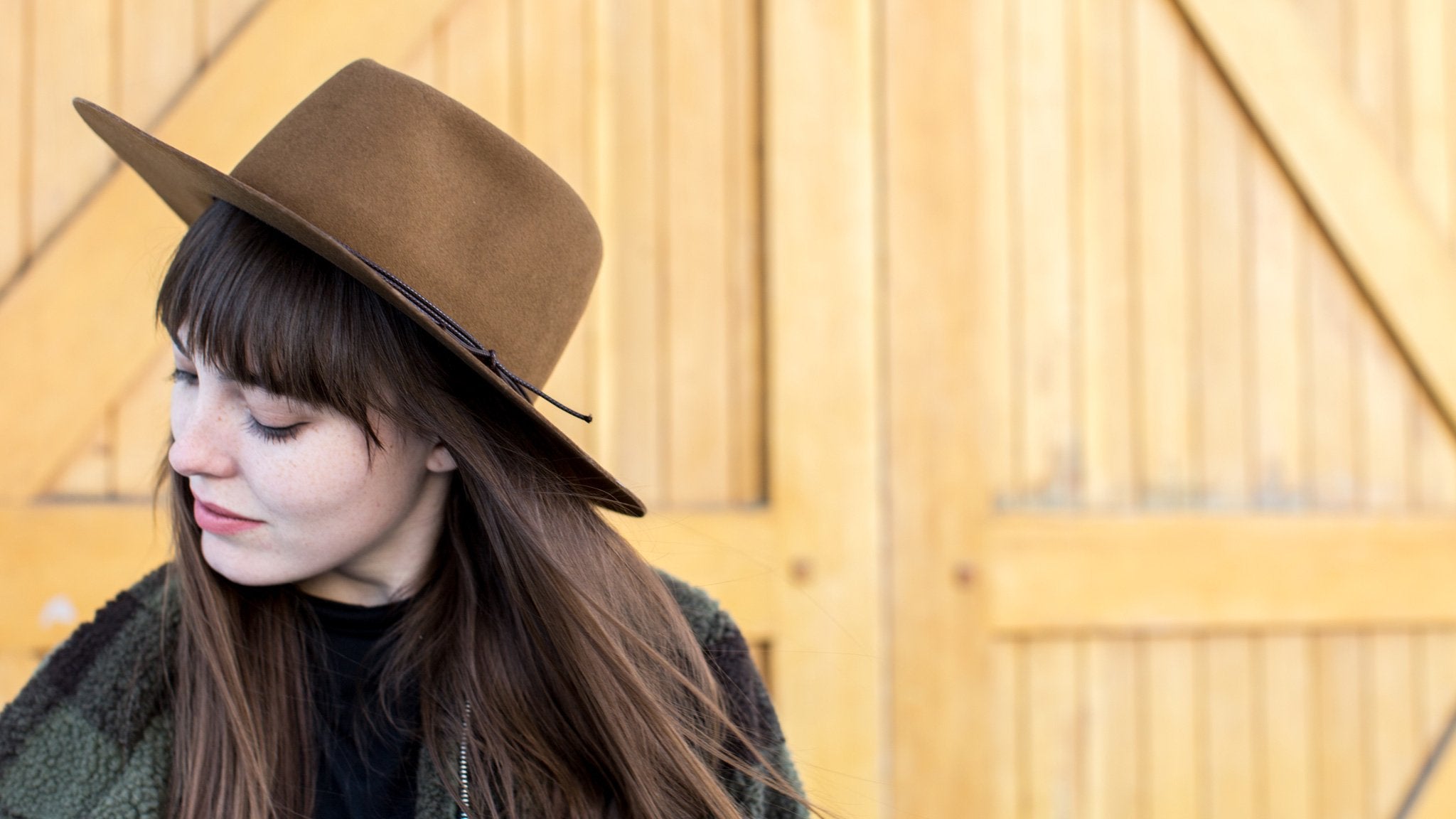 Goorin Bros. dakota wool wide brim fedora Whiskey hero shot on female model