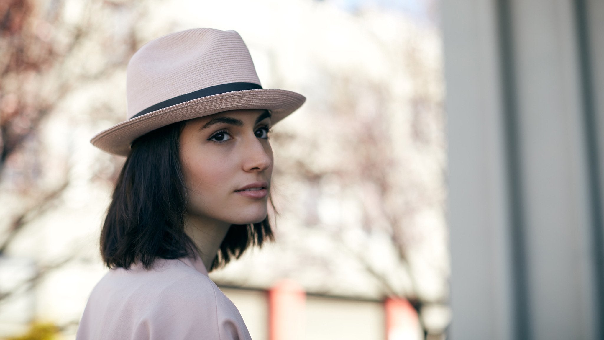 Goorin Bros. the gilder center dent medium brim straw fedora hat Pink hero shot on female model