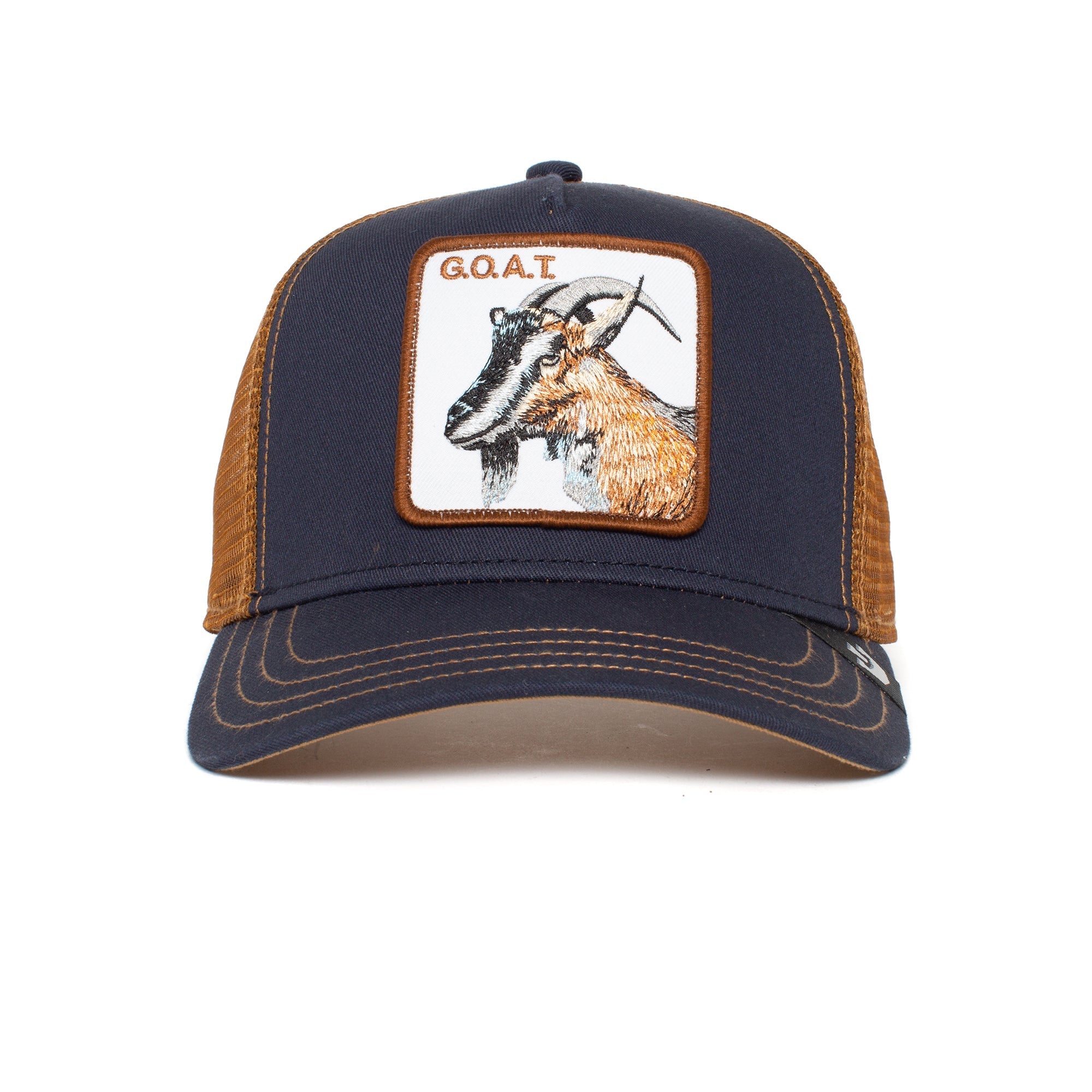 The GOAT is a navy trucker hat with a patch featuring a goat and G.O.A.T. text on the front. Colors may fade with time, giving it unique character.