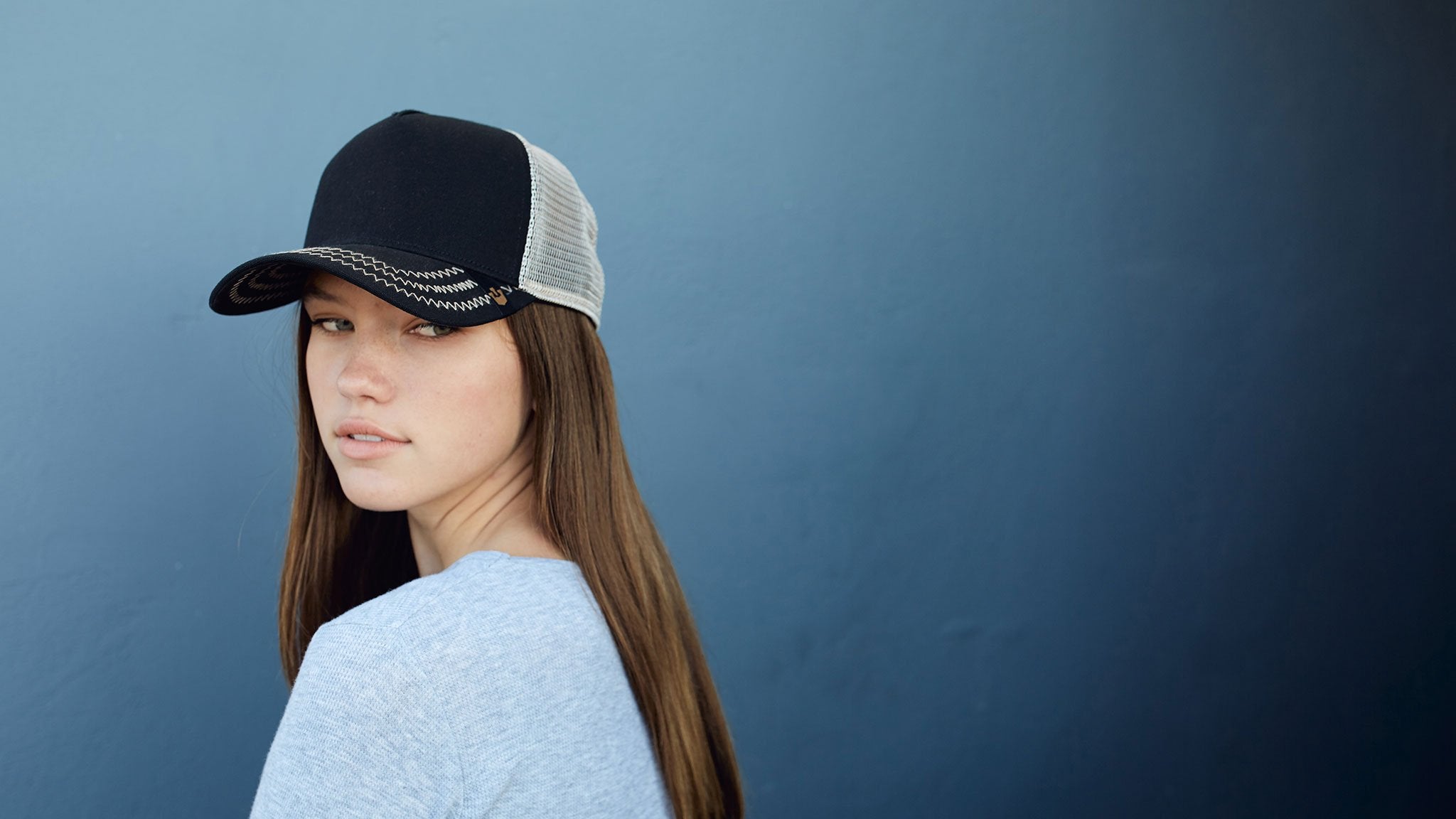 Goorin Bros. black out cotton 5 panel baseball cap Black hero shot on female model