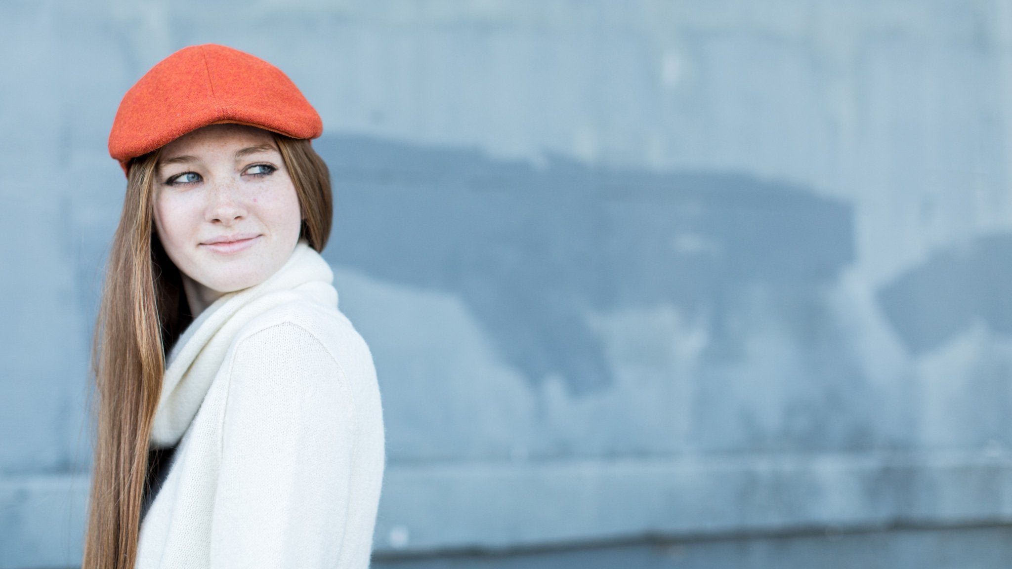 Goorin Bros. wrigley wool blend 6 panel duckbill flatcap Orange hero shot on female model