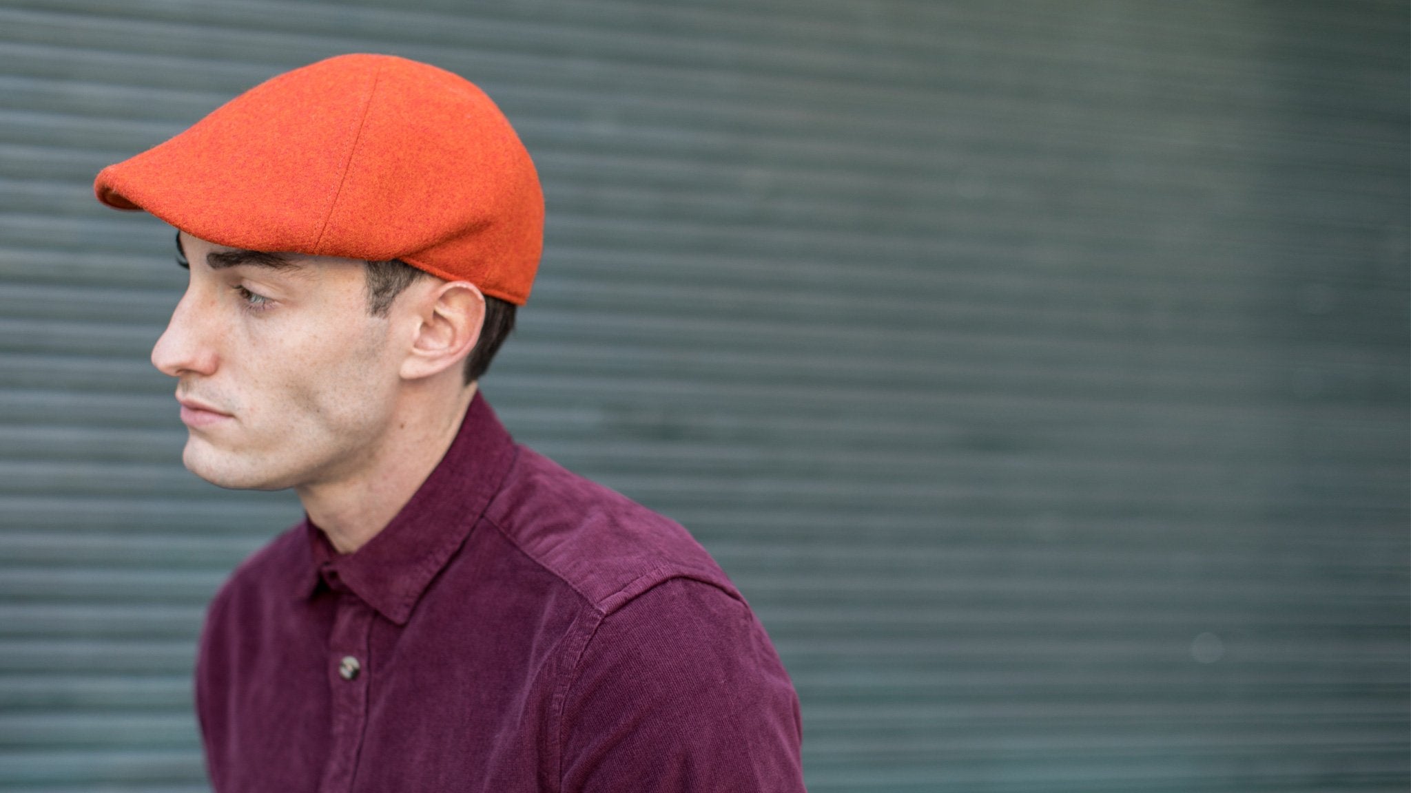 Goorin Bros. wrigley wool blend 6 panel duckbill flatcap Orange hero shot on male model