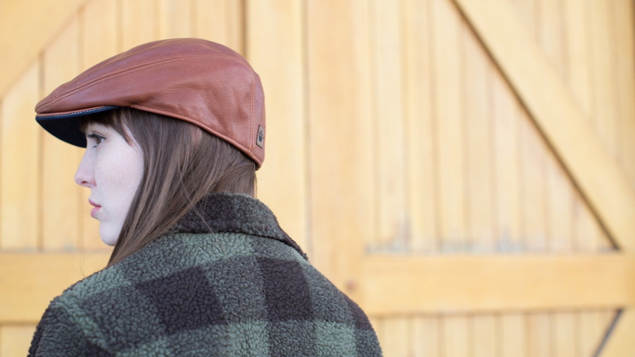 Goorin Bros. chandler fields leather ivy flatcap Whiskey hero shot on female model