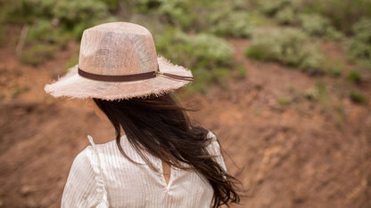 Goorin Bros. orange beach sinamay wide brim fedora Pink hero shot on female model