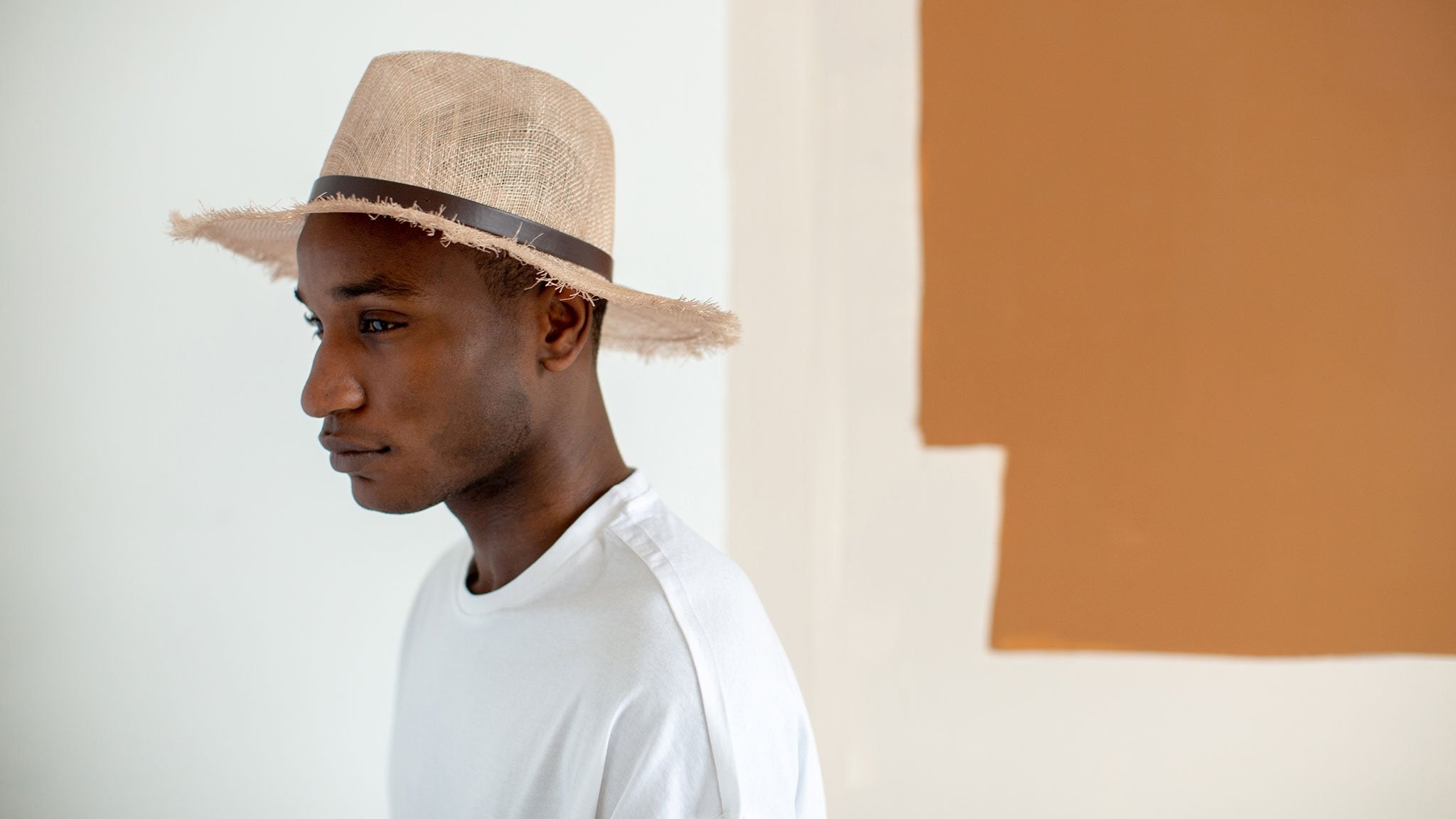 Goorin Bros. orange beach sinamay wide brim fedora Pink hero shot on male model