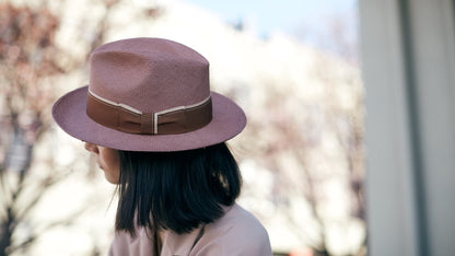 Goorin Bros. ruben gonzalez center dent wide brim straw fedora hat Pink hero shot on female model