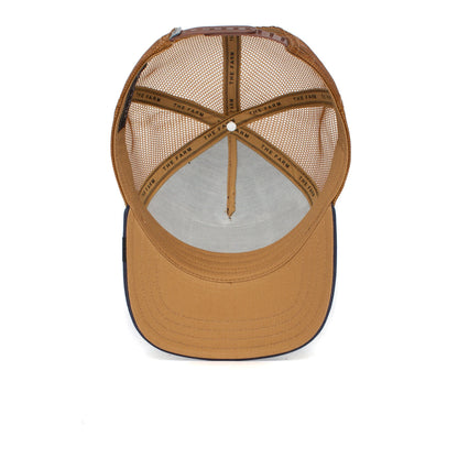 The GOAT brown mesh trucker hat viewed from above, showing inside details and The Land text on the inner seams—a unique design that gains vintage character as it naturally fades over time.