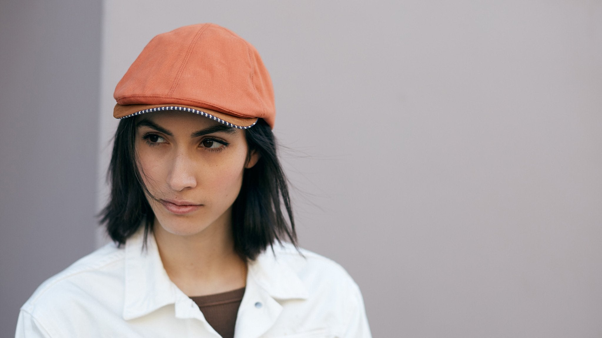 Goorin Bros. swamp water cotton 6 panel ivy flatcap Rust hero shot on female model
