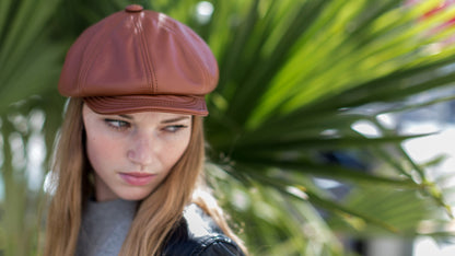 Goorin Bros. shortstack leather ivy flatcap Whiskey  hero shot on female model