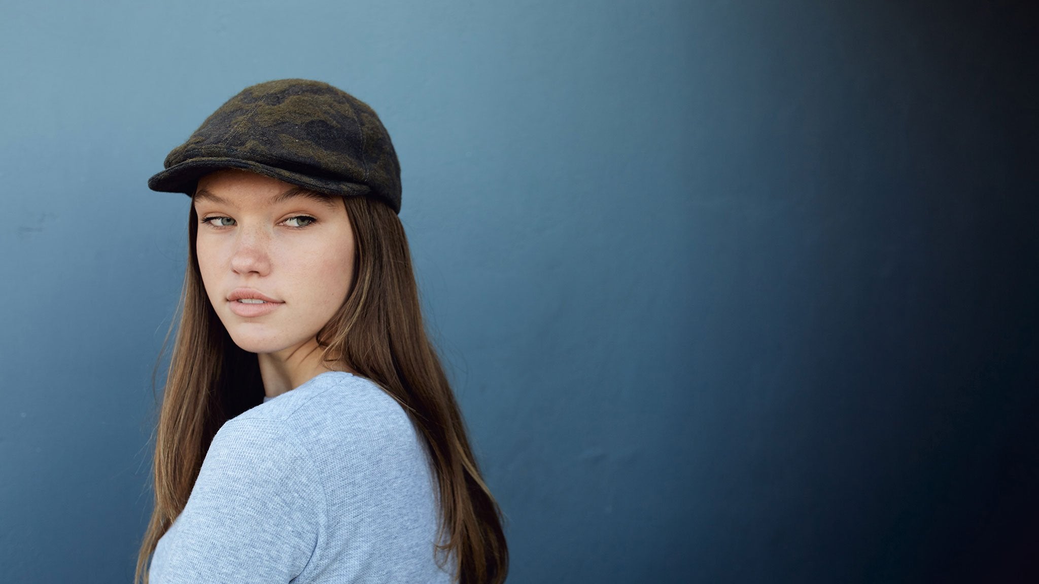 Goorin Bros. hidden views wool blend 6 panel ivy flatcap Olive hero shot on female model