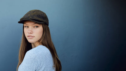 Goorin Bros. hidden views wool blend 6 panel ivy flatcap Olive hero shot on female model