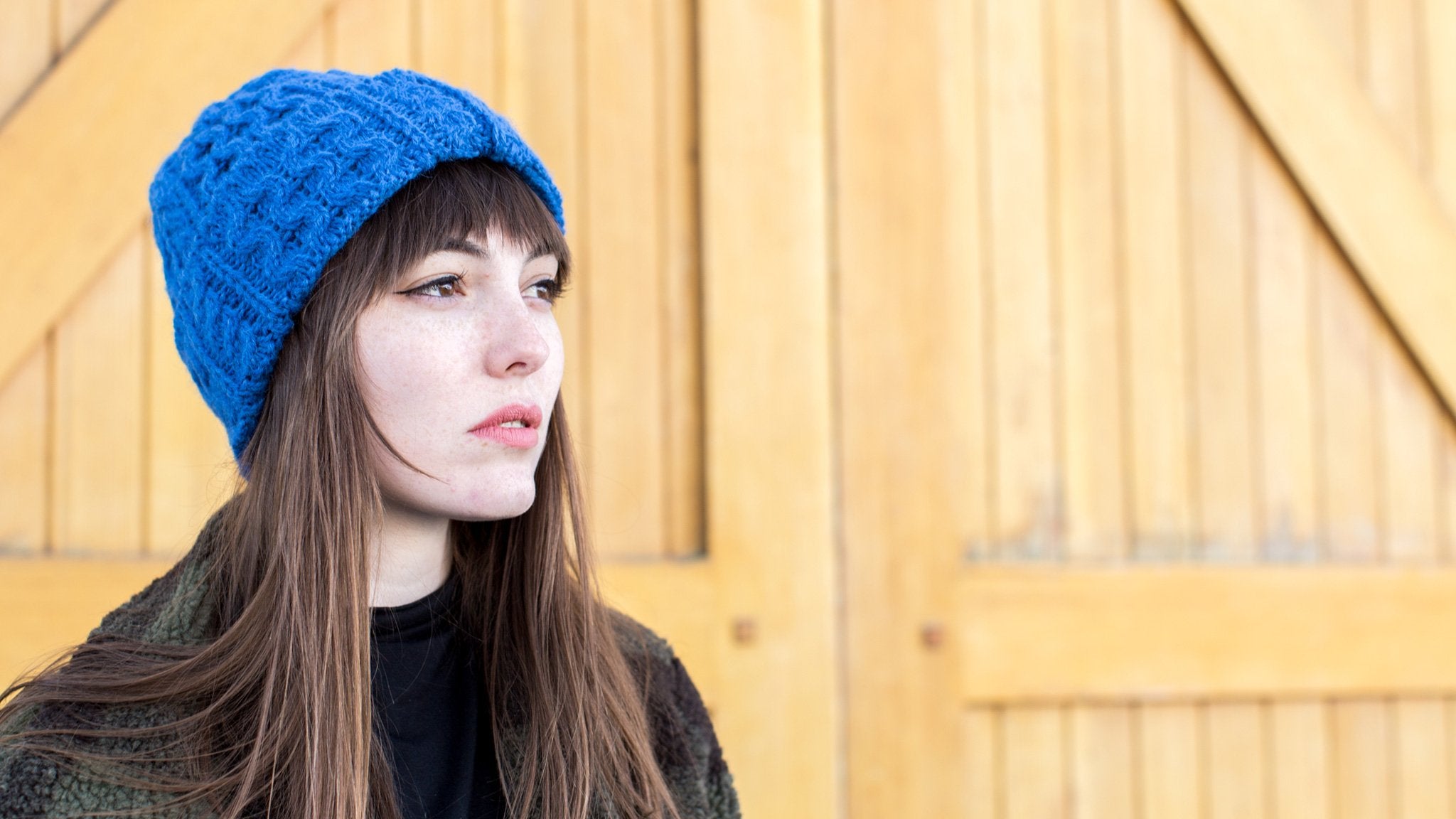 Goorin Bros. sunstone alpaca cable knit beanie Blue  hero shot on female model