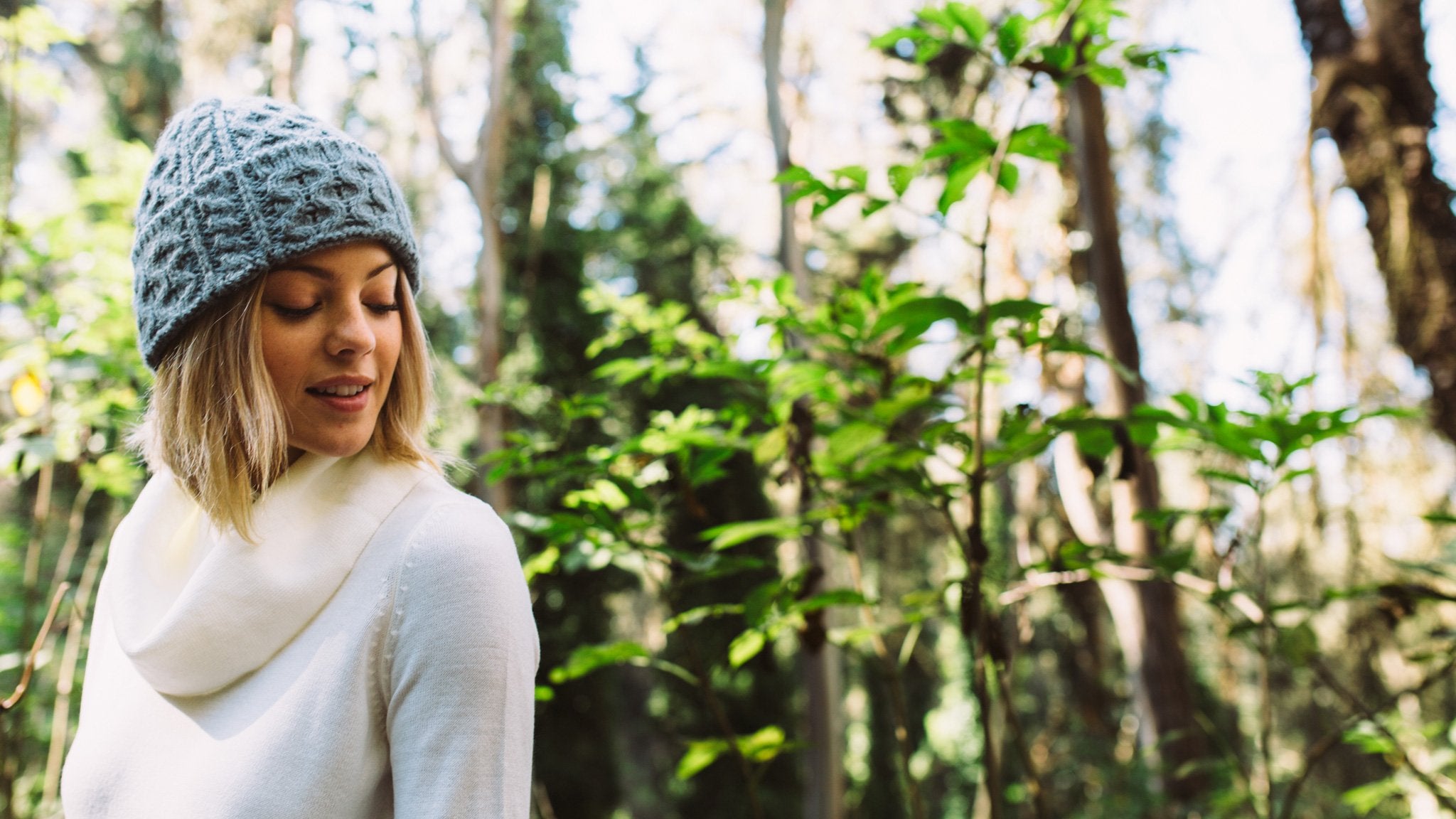 Goorin Bros. sunstone alpaca cable knit beanie Charcoal  hero shot on female model